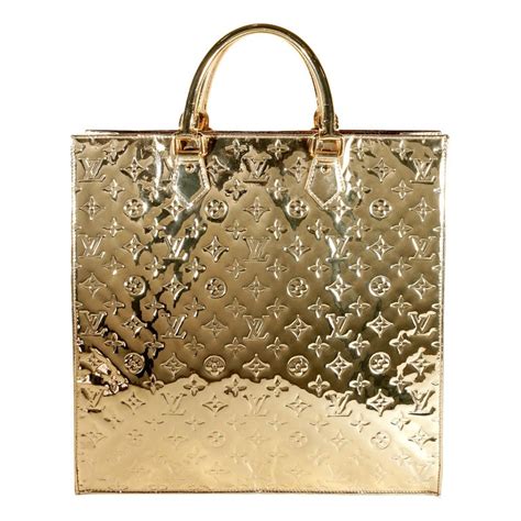 louis vuitton bag with gold v